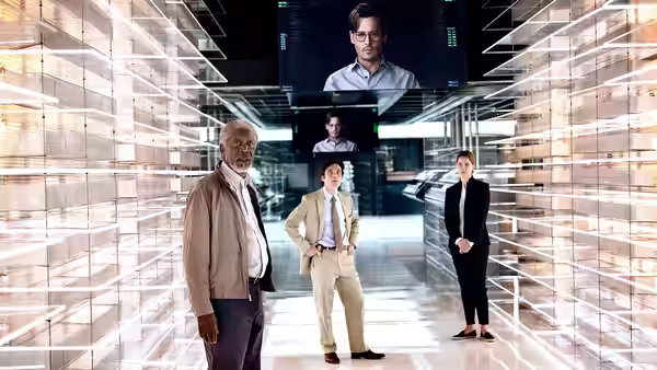 A man and woman stand with an older man in a brightly lit server room