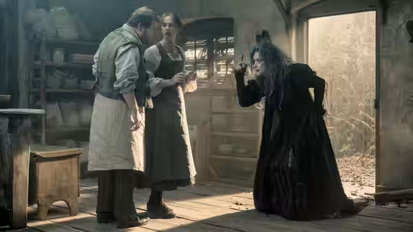 The Baker (James Corden) and his wife (Emily Blunt) confront the Witch (Meryl Streep) inside their shop