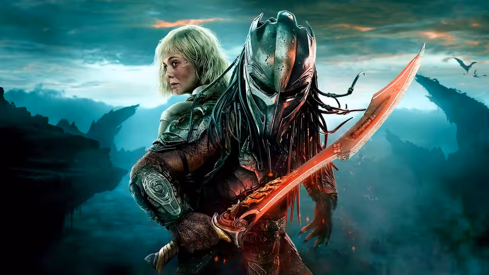 Thia (Elle Fanning) stands beside a Predator holding a glowing red blade