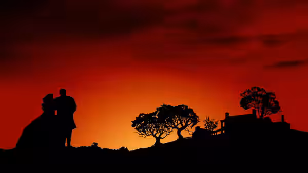 A couple stands on a hill at sunset near trees and a house