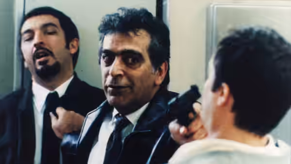 Marcos (Ricardo Darín) stands beside a man in a leather jacket