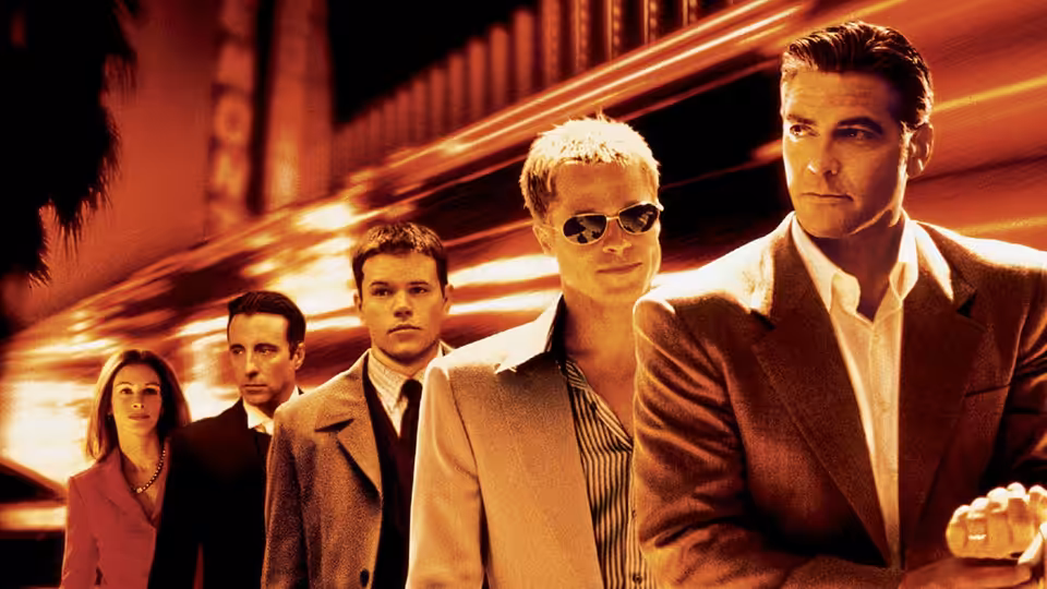 Danny Ocean (George Clooney) and crew standing together on the Las Vegas strip