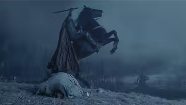 The Hessian Horseman rears on horseback, raising his sword above a prone figure