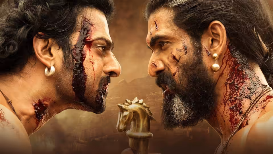 Amarendra Bāhubali (Prabhas) and Bhallaladeva (Rana Daggubati) face off bloodied