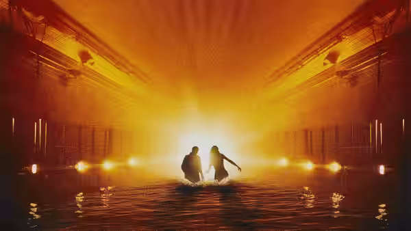 Two figures wade through floodwater toward a bright opening in a tunnel