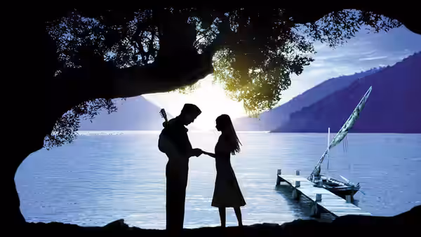 A mandolin-playing man and a woman hold hands beneath a tree beside a lakeside pier
