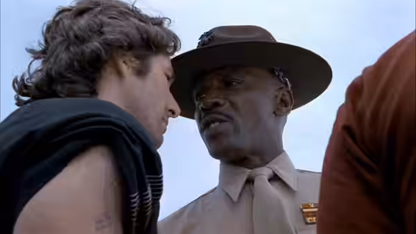 Sergeant Emil Foley (Louis Gossett Jr.) confronts Zack Mayo (Richard Gere) during training