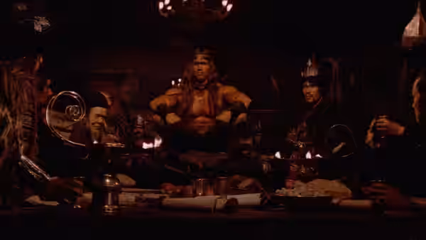 Conan (Arnold Schwarzenegger) and companions gather around a table in a dim hall