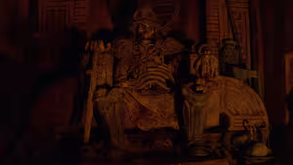 A massive armored figure sits on a throne in a shadowy hall