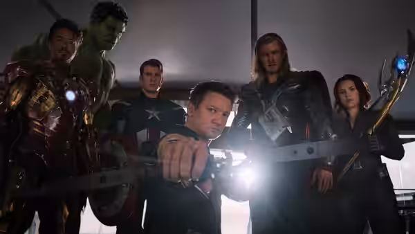 Iron Man, Hulk, Captain America, Thor and Black Widow posing with weapons