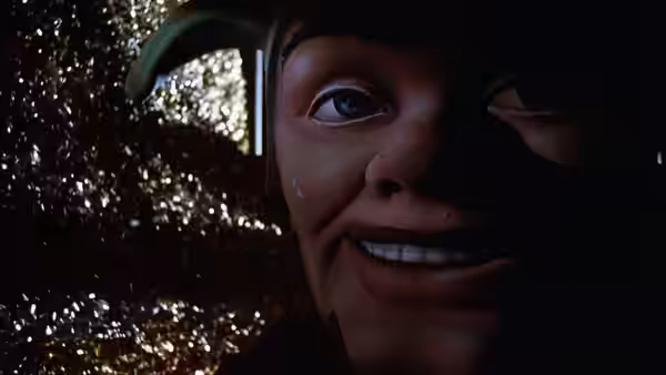 A woman in a dark hat smiles beside a glittering wall