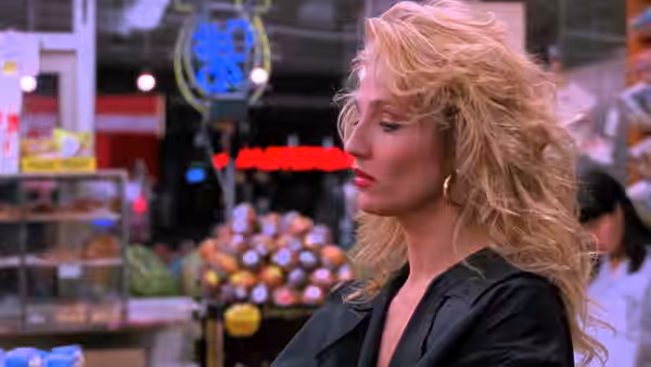 Helen Cruger (Ellen Barkin) stands in a grocery store