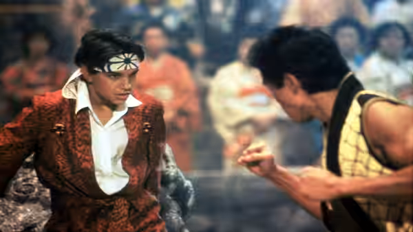 Daniel (Ralph Macchio) faces Chozen (Yuji Okumoto) in a crowded fighting arena