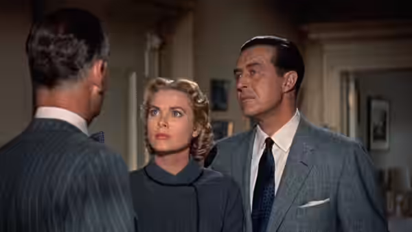 Mark Halliday faces Margot Wendice (Grace Kelly) and Tony Wendice (Ray Milland) during a tense discussion