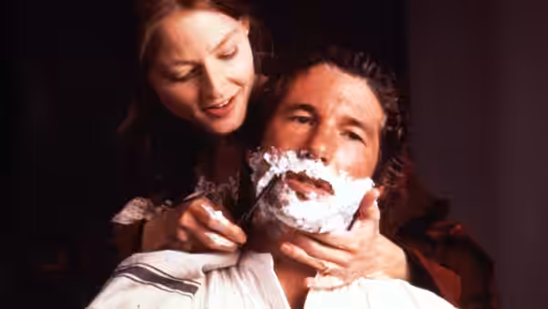 Laurel Sommersby (Jodie Foster) playfully shaves John Sommersby (Richard Gere)