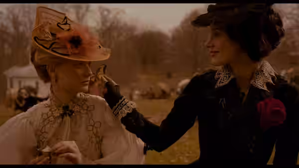 Lady Lucille Sharpe adjusts Edith Cushing’s hat at an outdoor gathering