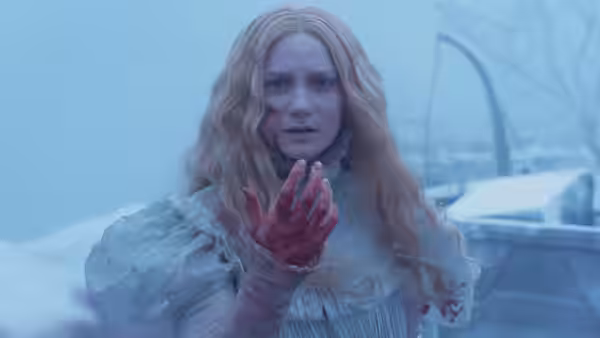 Edith Cushing examines her bloodied hand in a snowy courtyard