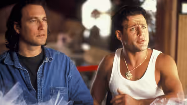 Ian Miller (John Corbett) listens as Nick Portokalos (Louis Mandylor) talks in a workshop
