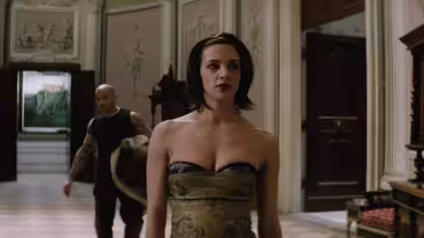 Yelena (Asia Argento) stands in an ornate hall as Xander Cage (Vin Diesel) walks behind her