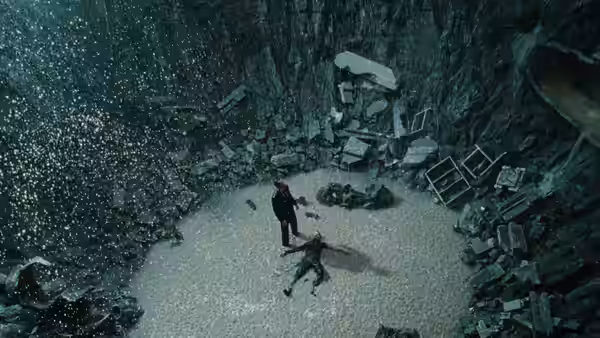 Neo faces a fallen opponent in a vast crater of rubble