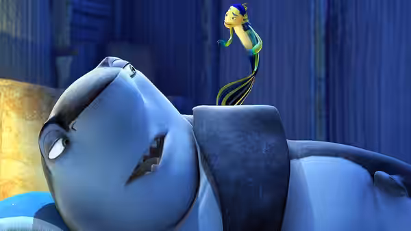 Lenny reclines as a small fish balances on his back