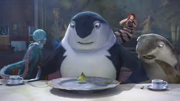 Don Lino sits at a dining table with several fish gathered around him