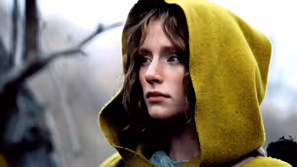 Ivy Walker (Bryce Dallas Howard) wears a yellow hood in the forest