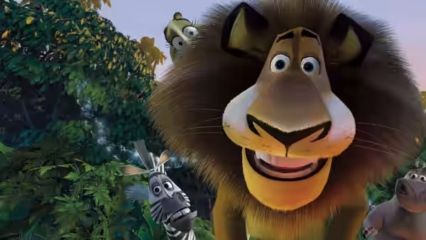 Alex (Ben Stiller) leans toward the viewer as Marty and friends peer through jungle foliage