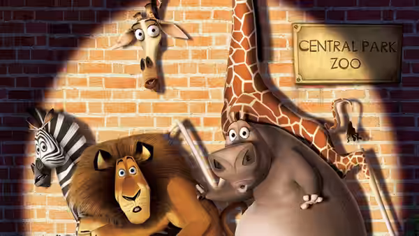 Alex, Marty, Gloria, and Melman crowd beneath the Central Park Zoo sign