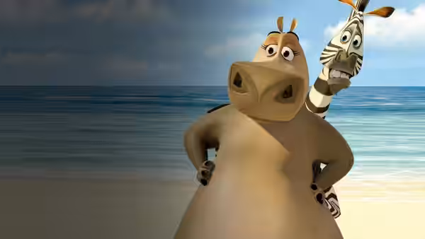 Gloria stands hands-on-hips on the beach while Marty peeks from behind her