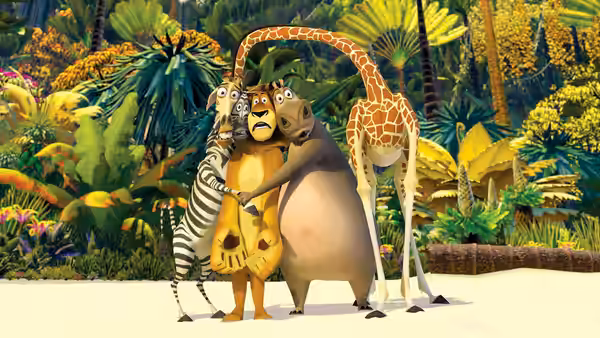 Marty, Alex, Gloria, and Melman huddle together amid dense tropical jungle plants
