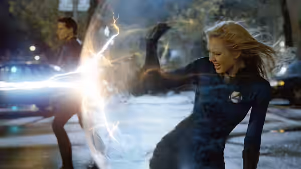 Sue Storm (Jessica Alba) recoils as energy crackles between her and Johnny Storm (Chris Evans) on a street