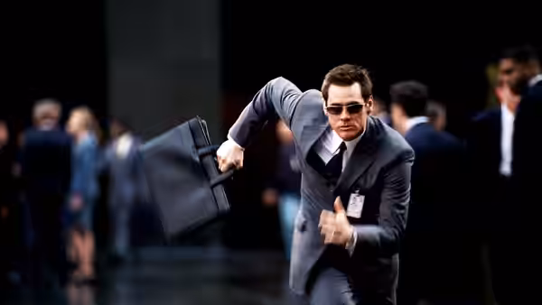 Dick Harper (Jim Carrey) sprints through a business district carrying a briefcase