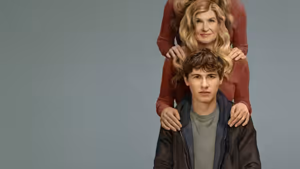 Sonny (Sam Nivola) sits before Ellen (Connie Britton), with a red-clad figure behind them