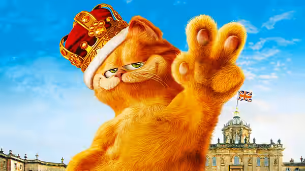 Prince wears a crown and raises his paw before a London palace