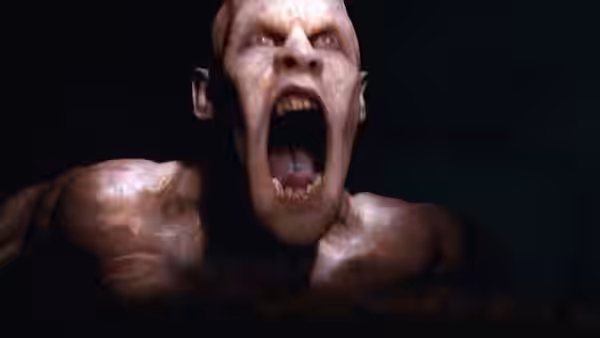 A pale infected man lunges forward with his mouth open