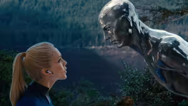Sue Richards (Jessica Alba) faces the Silver Surfer (Doug Jones) in a wooded clearing