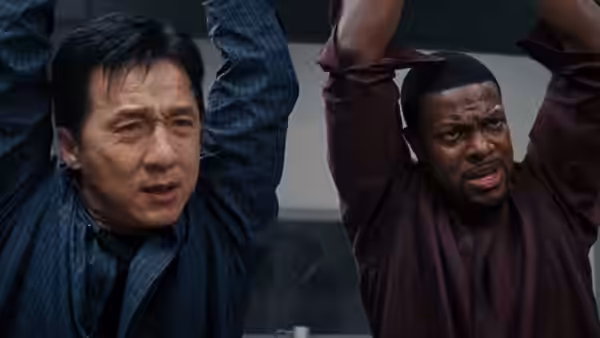 Yan Naing Lee (Jackie Chan) and James Carter (Chris Tucker) hang from a structure