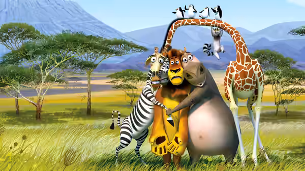Alex, Marty, Gloria and Melman huddle together in the savanna as penguins perch above them