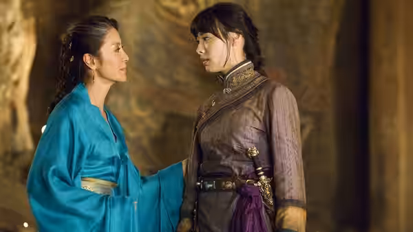 Zi Yuan (Michelle Yeoh) faces Lin (Isabella Leong) inside an ornate chamber