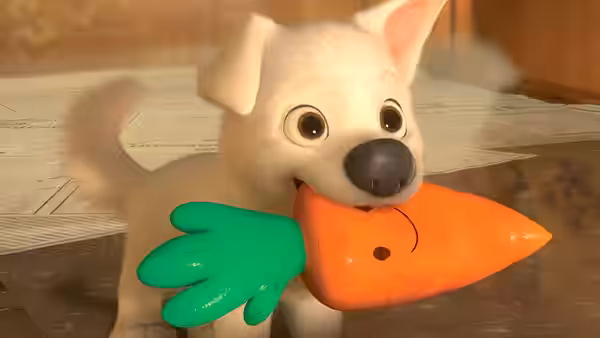 Bolt holds a large orange carrot toy in his mouth