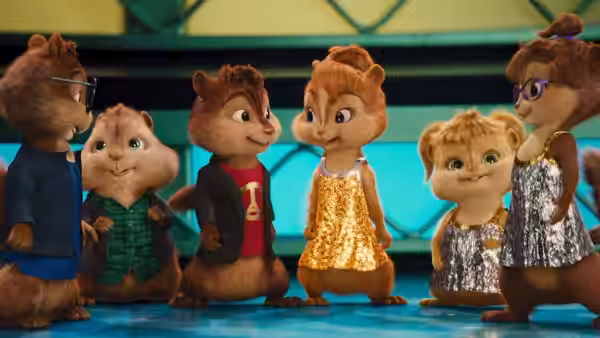 The Chipmunks and Chipettes gather on a stage in performance outfits