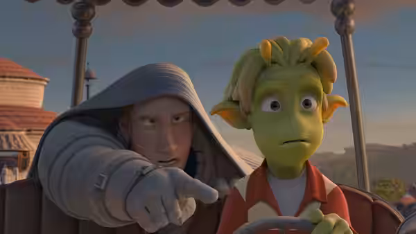 Chuck (Dwayne Johnson), wearing a hood, points ahead while Lem (Justin Long) drives