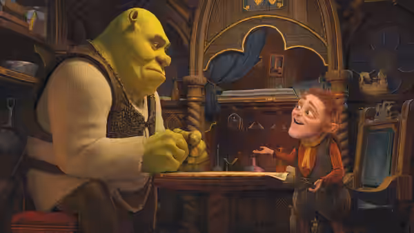 Shrek sits at a tavern table as Rumpelstiltskin gestures beside him