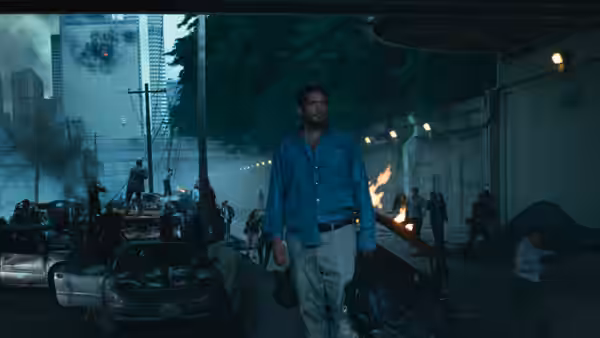 Sam Witwicky (Shia LaBeouf) walks through a burning, wrecked city street