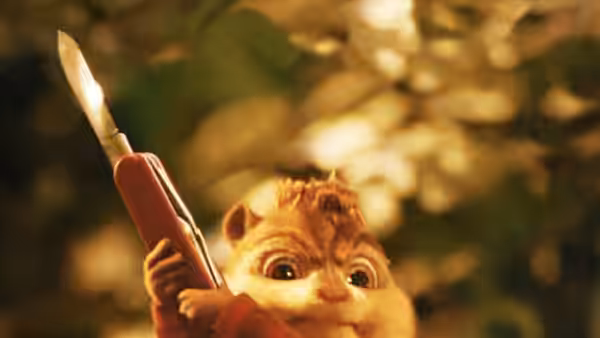 Alvin grips a sharpened stick in the jungle