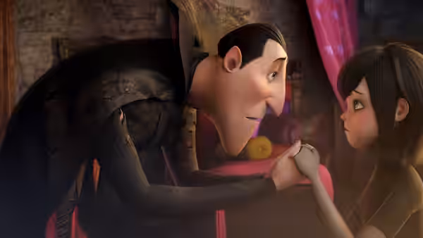 Count Dracula (Adam Sandler) offers Mavis Dracula (Selena Gomez) a small object indoors