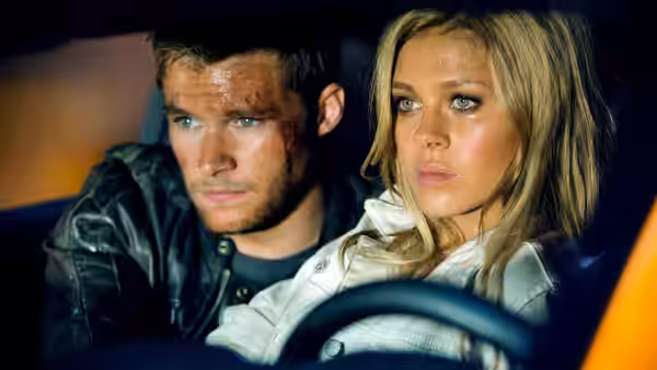 Shane Dyson and Tessa Yeager sit together inside a car