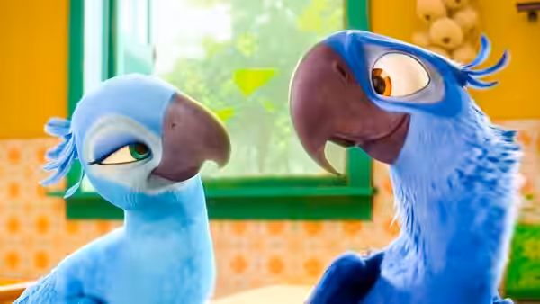 Jewel and Blu face each other inside a bright kitchen
