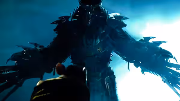 An armored figure looms over a person in a dark, blue-lit room